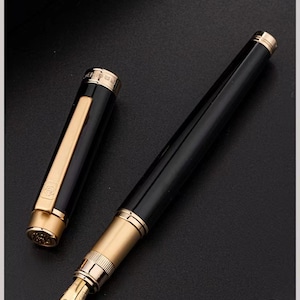 Pluma estilográfica negra St Penpps con punta ajustable para escritura dura y suave