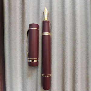 Pluma estilográfica St. Penpps con tapa de émbolo y crisantemo limón - Plumín Togi EF/F/Naginata Red