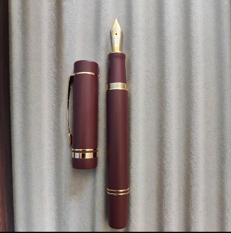 Pluma estilográfica St. Penpps con tapa de émbolo y crisantemo limón - Plumín Togi EF/F/Naginata Red