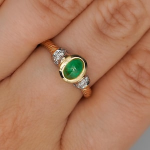 Natural 3/4 Carat Cabochon Cut Emerald in Bezel Set 14K Yellow Gold Ring with a Rope Textured Ring Shank