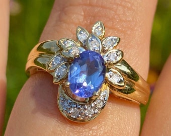 0.69 Carat Oval Cut Natural Certified AA Tanzanite & 0.11 Carat Diamond in 14K Yellow Gold Statement Ring Adjustable Ring Size 7 3/4