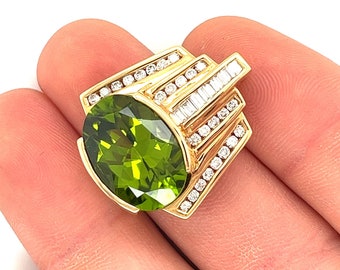 Vintage Geometric 12 Carat Oval-Cut Green Peridot with Channel Set Baguette & Round Cut Diamonds in a  18K White and Yellow Gold Pendant