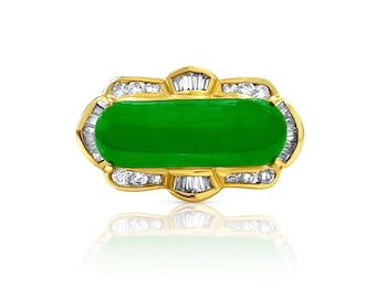 May include: A green jade ring with a gold setting and diamond accents.