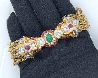 18K Gold & Platinum Ruby, Diamond, Emerald Biting Lion Motif Rope Chain Bracelet | Lion Heads Biting A Round Emerald, Ruby and Diamond Halo