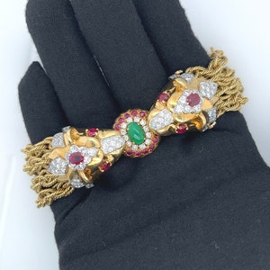 18K Gold & Platinum Ruby, Diamond, Emerald Biting Lion Motif Rope Chain Bracelet | Lion Heads Biting A Round Emerald, Ruby and Diamond Halo