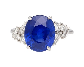 GRS Certified 6.35 Carat Royal Blue Oval Cut Natural Sapphire with Trillion & Round Cut Diamonds Ring in Platinum