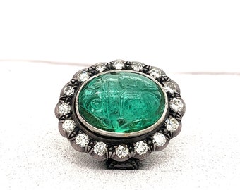 Victorian Era 15 Carat Carved Emerald "Beetle" Motif Antique Ring with Diamond Halo in 18K Yellow Gold and Silver