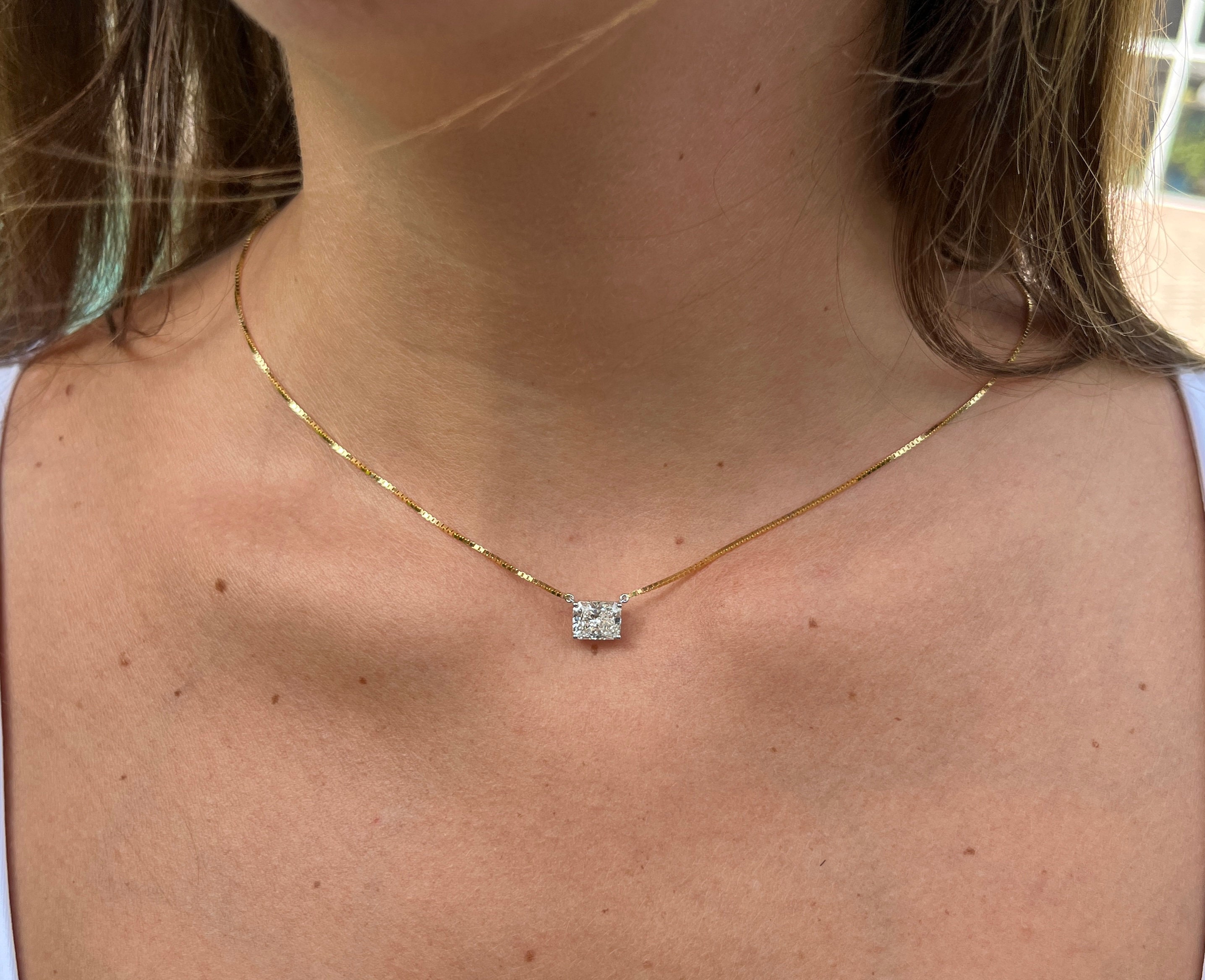 Radiant cut diamond pendant deals