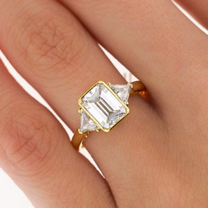 BOUCHERON Signed Ring With Bezel Set GIA Certified 2.09 Carat Emerald Cut E/SI1 Diamond and Trillion Side Stones image 1