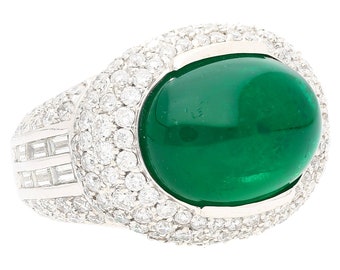 AGL Certified 10 Carat Cabochon Cut Natural Emerald Ring in 18K White Gold With a Round Cut Diamond Halo and Baguette Diamond Sides Stones