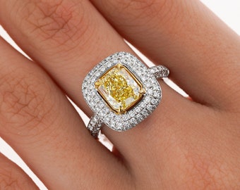 GIA Certified 2.35 Fancy Yellow Diamond with 1.0 CTTW Diamond Halo Side Stones in 18K White and Yellow Gold | SI1 clarity | Fancy Yellow