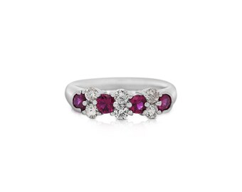 Natural 0.77 Carat Round Brilliant Cut Rich Red Ruby and