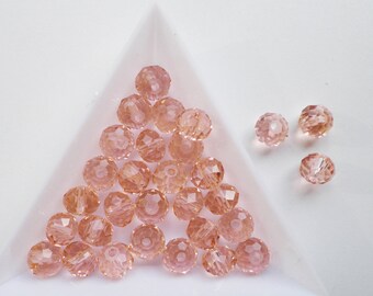 30 rosa Glasschliffperlen 6 x 8 mm