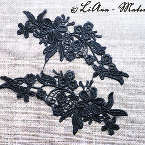 2 große schwarze Applikation Blumenranke