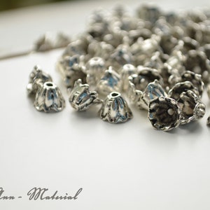 10 silberne Perlenkappen 8 mm Bild 2