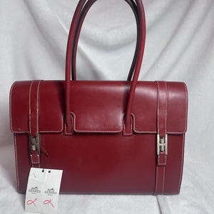 Bolso Hermès Drag 2/32 de piel de becerro en color rouge h con herrajes de paladio