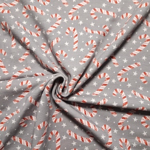 Sweatshirt fabric with grey and red candy canes – Christmas fabric by Diana von Glünz