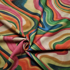 Cotton crepe Anja from Glünz T064. Beautiful summer fabric with colored streaks.