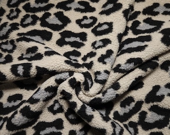 Tissu peluche doux à imprimé léopard beige, noir et bleu-gris de Noteboom Textiles – quantité restante : 0,39 m