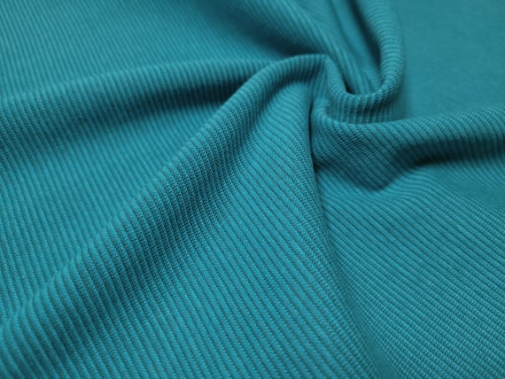 Rippenstrick Bündchenstoff in Petrol von Glünz – weicher elastischer Strickstoff mit feiner Rippstruktur für Ärmel Kragen und Saum