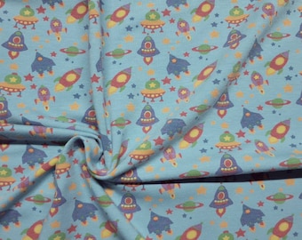 Remaining quantity 0.6 m space jersey fabric with spaceships and rockets