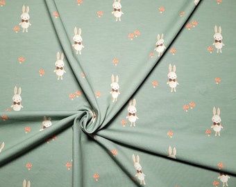 Cotton jersey Easter Easter bunny from Glünz. Mint green fabric with cute Easter bunnies and red toadstools