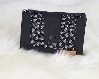 Black wallet with floral pattern