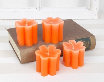 Kerzen Set 4 Stück Stückpreis 2,50 Euro Kerzen in Blütenform orange