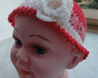 Red baby summer hat with flowers