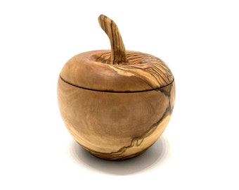 Tin like apple, made of olive wood