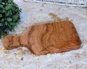 Small cutting board with handle made of olive wood