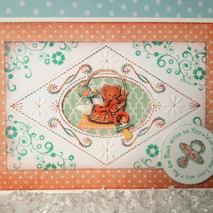 Greeting card &quot;Baby stuff in the basket&quot;