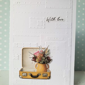 Tarjeta de felicitación "Flores en una maleta"