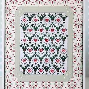 Carte de Noël « Rudi et coeurs »