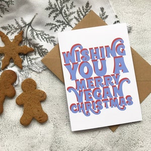 Carte de voeux de joyeux Noël végétalien bleu rouge