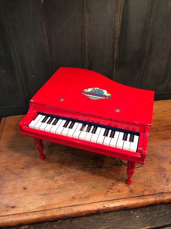 red toy piano