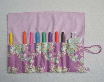 Crochet needle roll flowers on purple