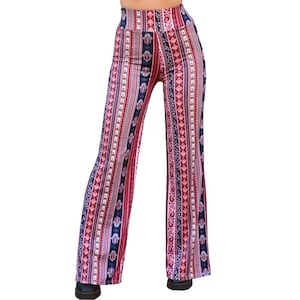 May include: Wide-leg pants with a colorful, patterned design featuring stripes and paisley motifs. The pants are a mix of red, pink, blue, and white.