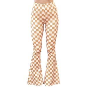 May include: Brown and white checkered flared pants. The pants have a wide leg and a high waist.