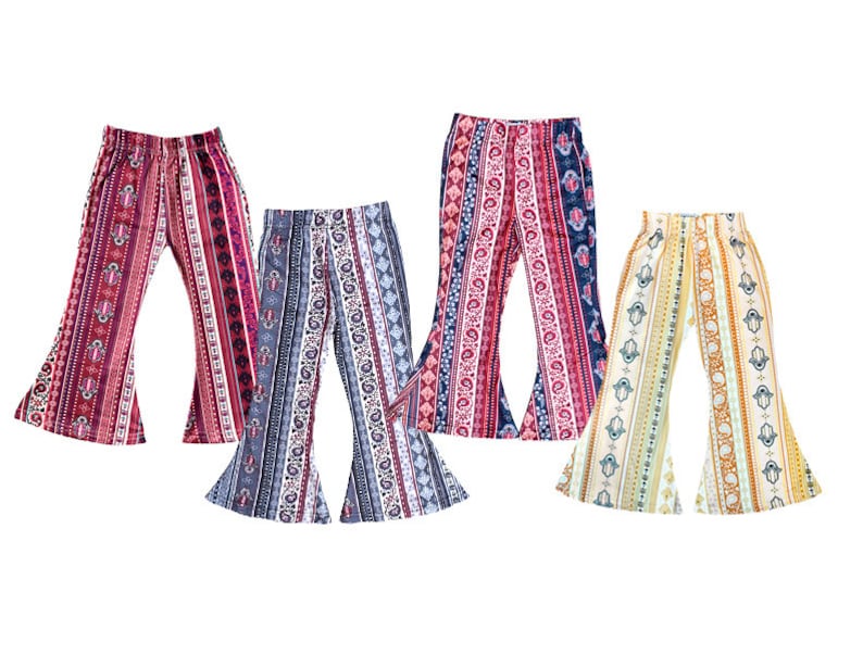 May include: Four pairs of bell bottom pants with different colorful patterned designs. The pants are made of a soft, comfortable fabric and have a wide leg opening.