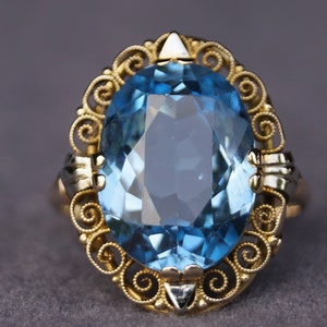 Vintage ring, yellow gold stamped 585/-, ring size 59.5, oval, faceted, synthetic spinel 16 x 12 mm in a claw setting, cleaned