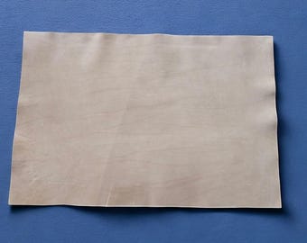 May include: A plain, off-white sheet of paper with a slightly textured surface.