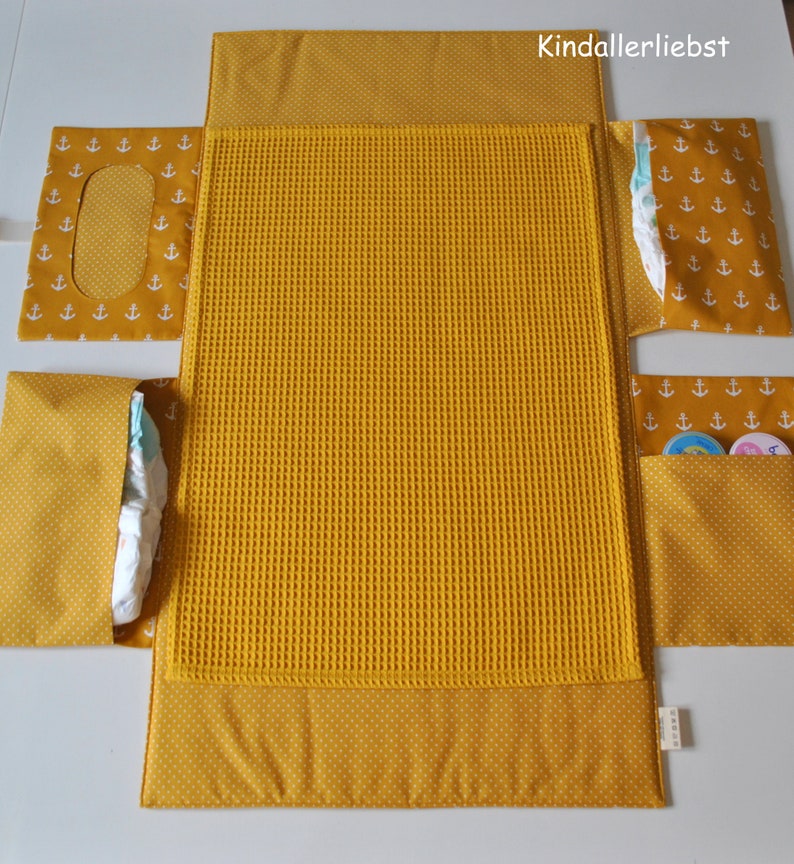 Diaper bag with changing mat that can be wiped clean for on the go image 1