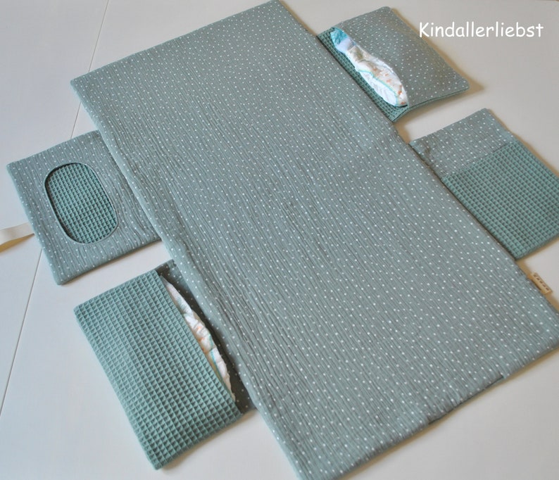 Diaper bag with changing mat that can be wiped clean for on the go image 3