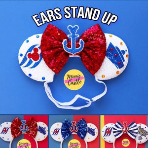 May include: A collection of themed mouse ear headbands. The headbands feature red sequin bows with a blue anchor, and white ears with nautical designs. The text "EARS STAND UP" is at the top.