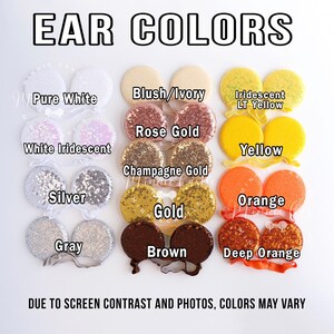 May include: A chart showing different colors of ear headbands. The colors include: pure white, blush/ivory, iridescent light yellow, rose gold, white iridescent, champagne gold, yellow, orange, silver, gold, gray, brown, and deep orange. The text "EAR COLORS" is at the top of the chart. The text "DUE TO SCREEN CONTRAST AND PHOTOS, COLORS MAY VARY" is at the bottom of the chart.