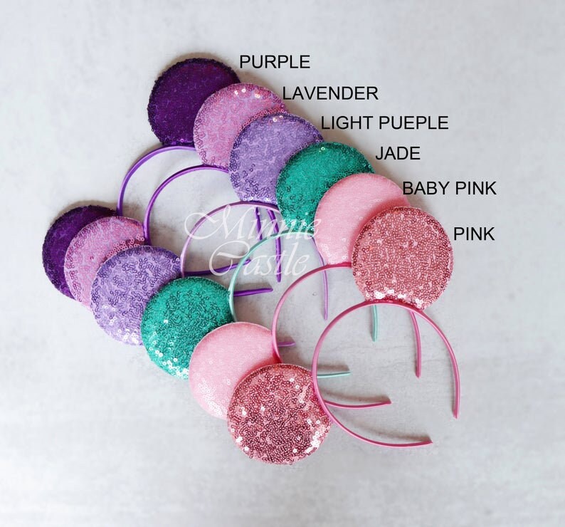 Puede incluir: Surtido de orejas de Minnie Mouse de lentejuelas en varios colores, incluyendo morado, lavanda, morado claro, jade, rosa beb&eacute; y rosa.