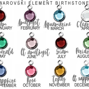 May include: A collection of Swarovski Element birthstone charms. Each charm features a different colored crystal, with the month and stone name written below. The colors include red, purple, blue, clear, green, pink, and yellow.