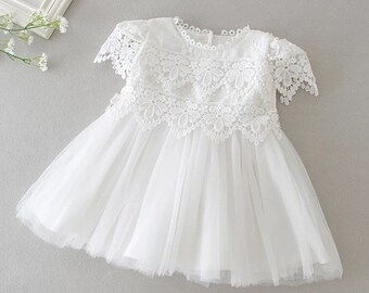 newborn baby girl white dress