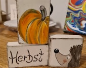 Autumn with hedgehog and pumpkin